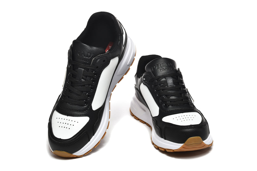 Prada Triangle Logo Low-Top Sneakers - Black & White with Gold Heel Lettering