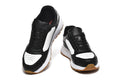 Prada Triangle Logo Low-Top Sneakers - Black & White with Gold Heel Lettering