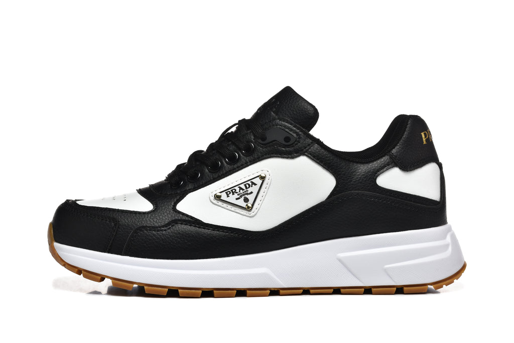Prada Triangle Logo Low-Top Sneakers - Black & White with Gold Heel Lettering